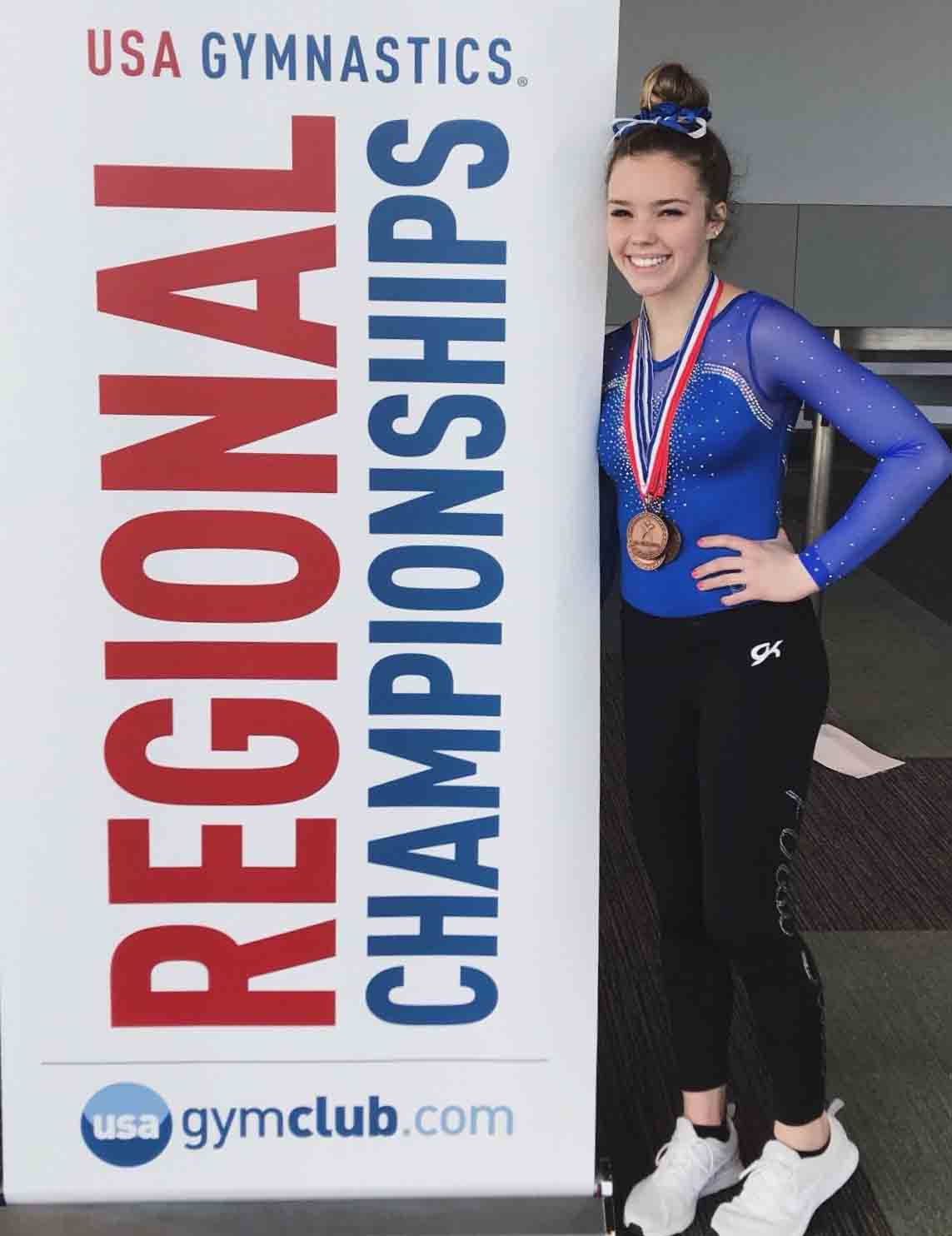 JC gymnast beaming after great year graphic